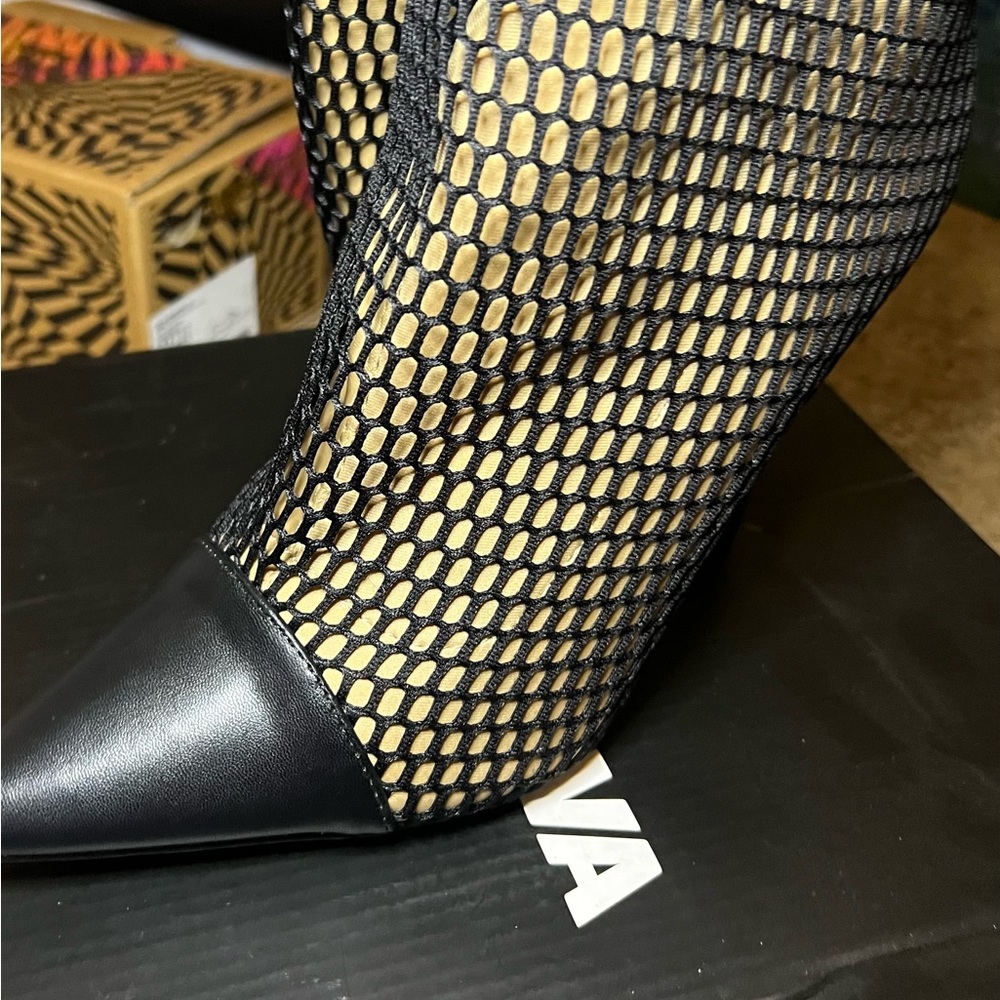 Fishnet knee length boots